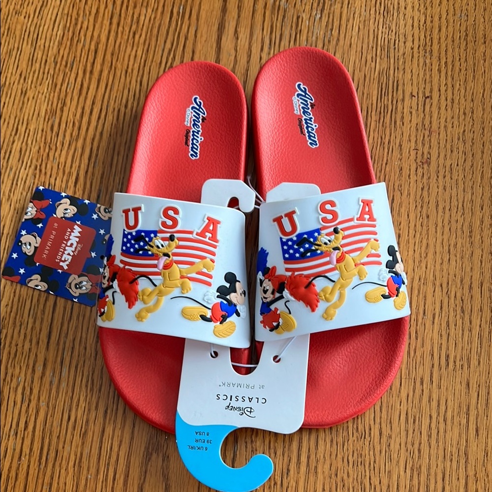 Disney Classics by Primark - Red USA Slide Sandals Open Toe
Brand New - Unisex